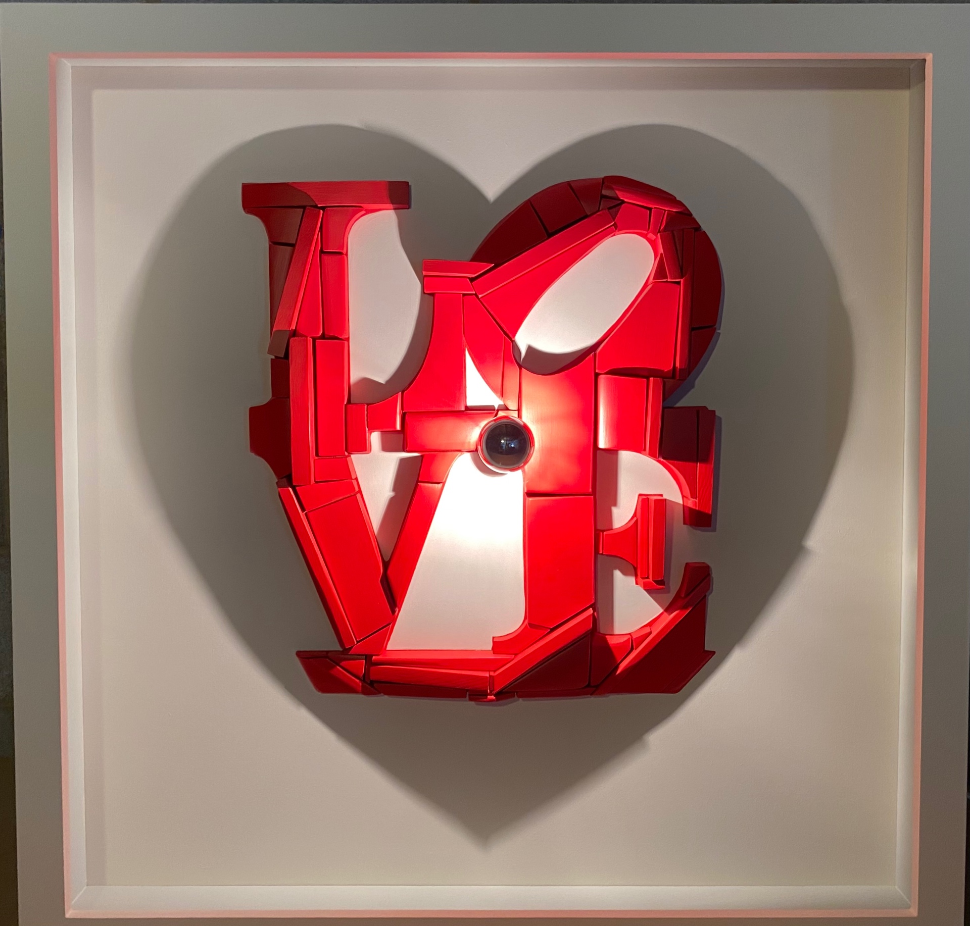 Dual-Image Silhouette in red-painted sculpted wood, homage to Robert Indiana