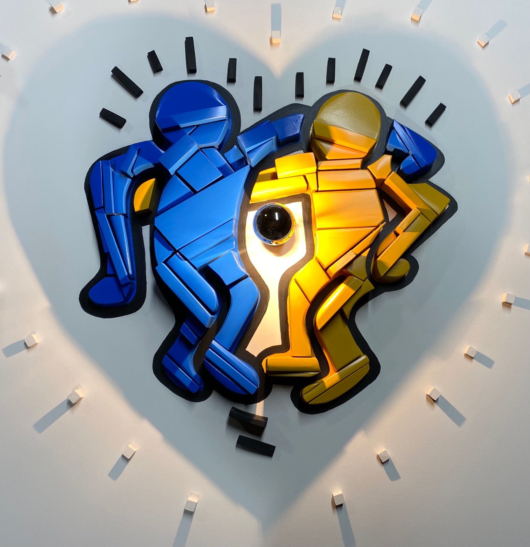 Dual-Image Silhouette with blue and yellow accents, homage to Keith Haring